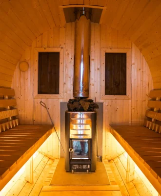 warm-sauna-room-with-central-wood-stove-Okra pool